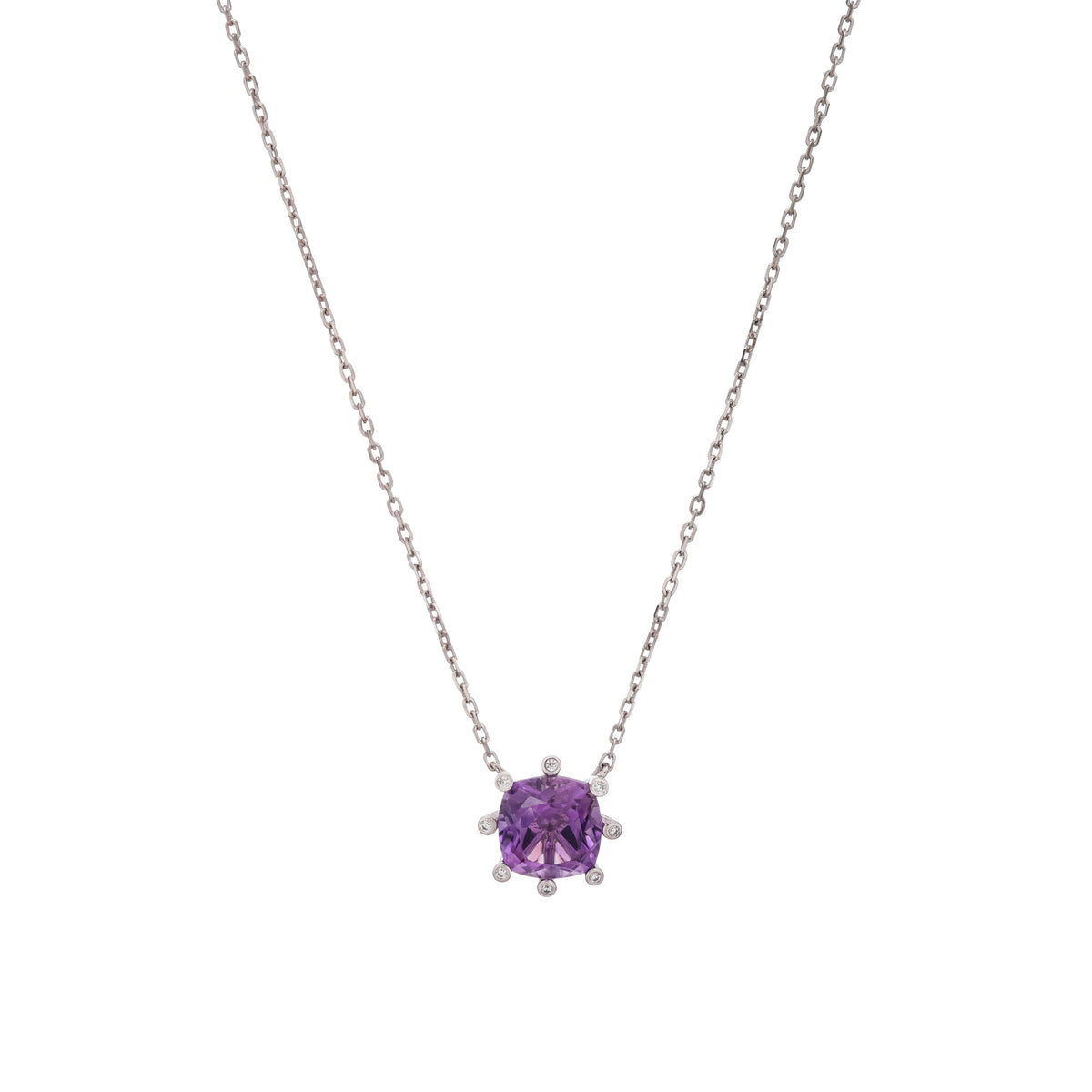 A silver-toned necklace featuring a cushion-cut purple gemstone pendant in a prong setting, flanked by small clear accent stones, shown against a plain white background. 